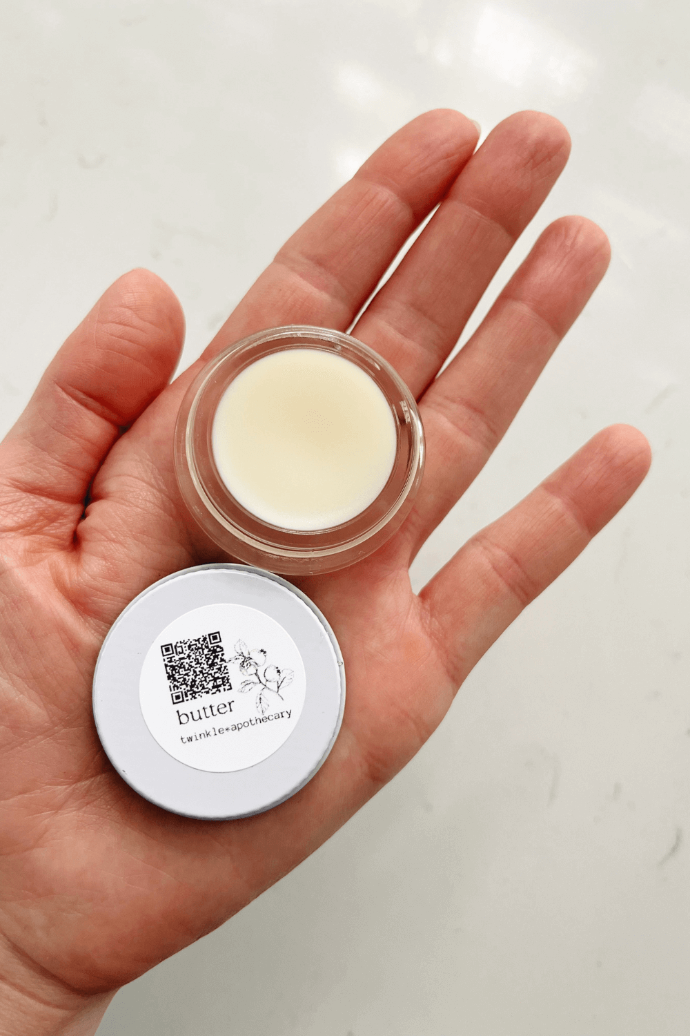 sample jar of twinkle apothecary butter moisturizer for face and body 
