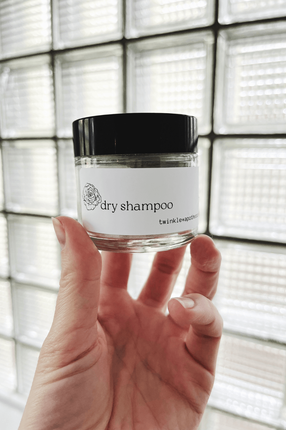 twinkle apothecary natural dry shampoo in a refillable glass jar