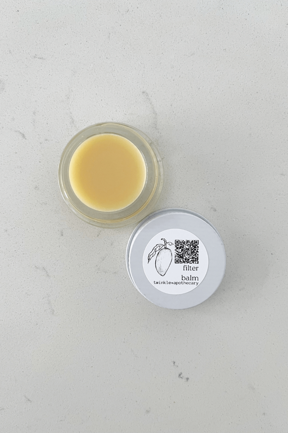 sample jar of twinkle apothecary filter balm: makeup and moisturizer hybrid skincare 