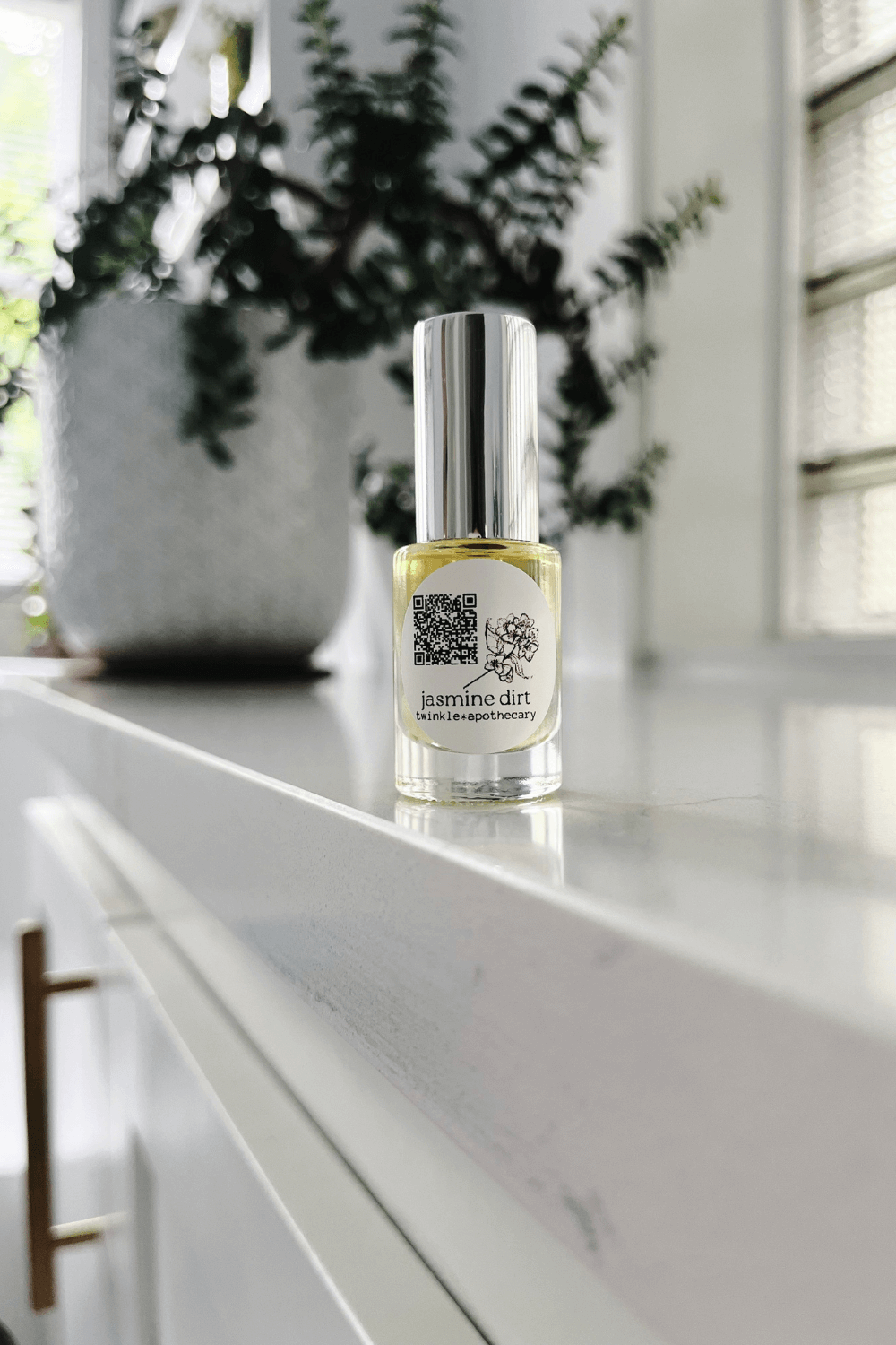 5 ml bottle of jasmine dirt organic perfume by twinkle apothecary 